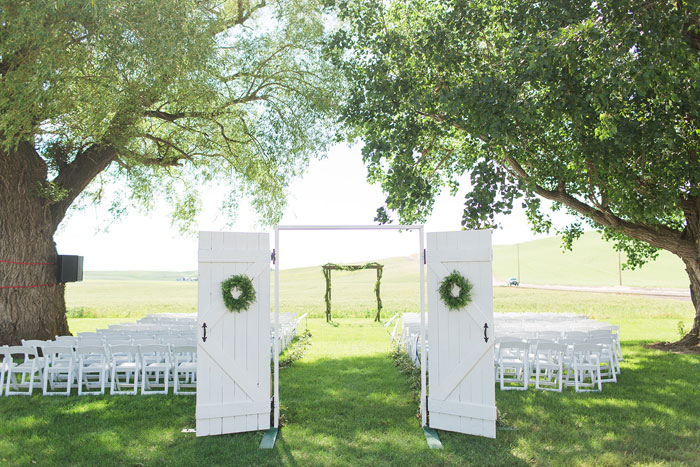 beautiful barn doors was placed at the entrance leading to the altar